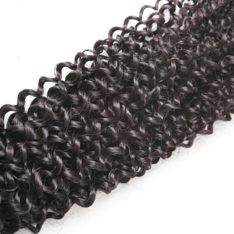 Close-up of 10A curly hair texture – virgin hair extensions